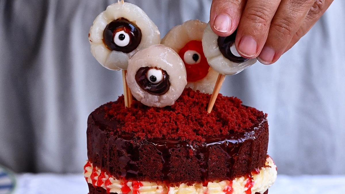 decorating a halloween cake