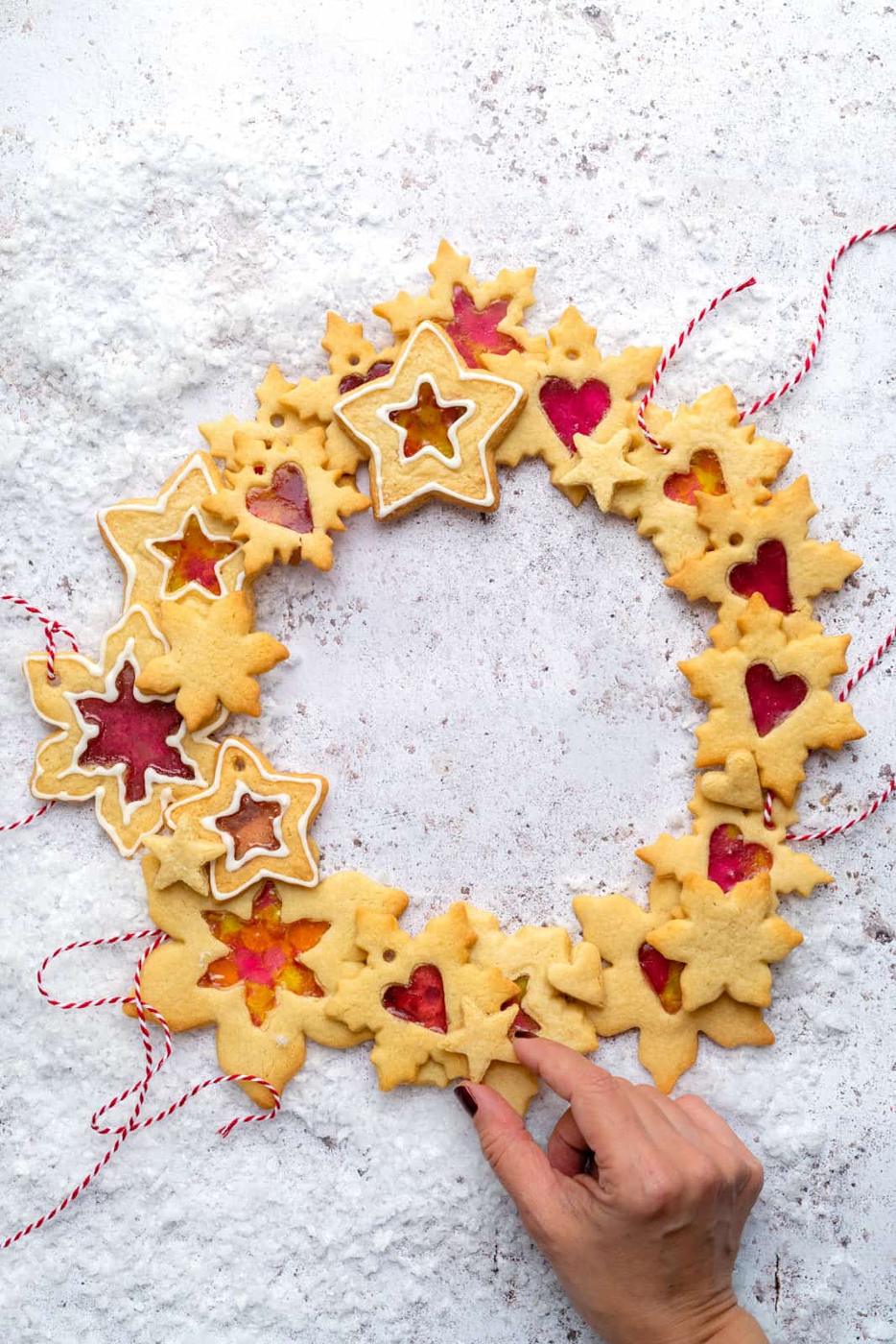 Stained glass cookies arranged in a wreath shape