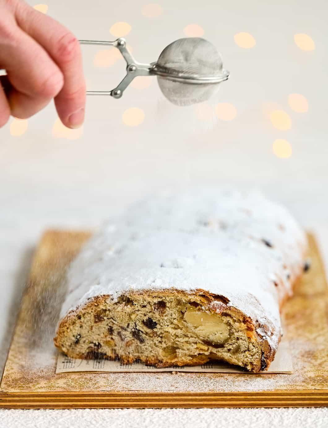 Dusting Stollen loaf with sugar