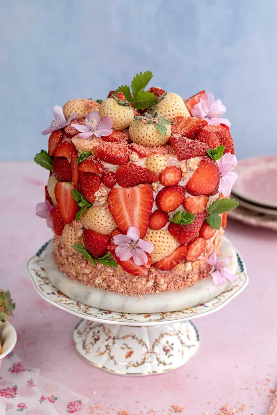 Strawberry cake on a cake stand