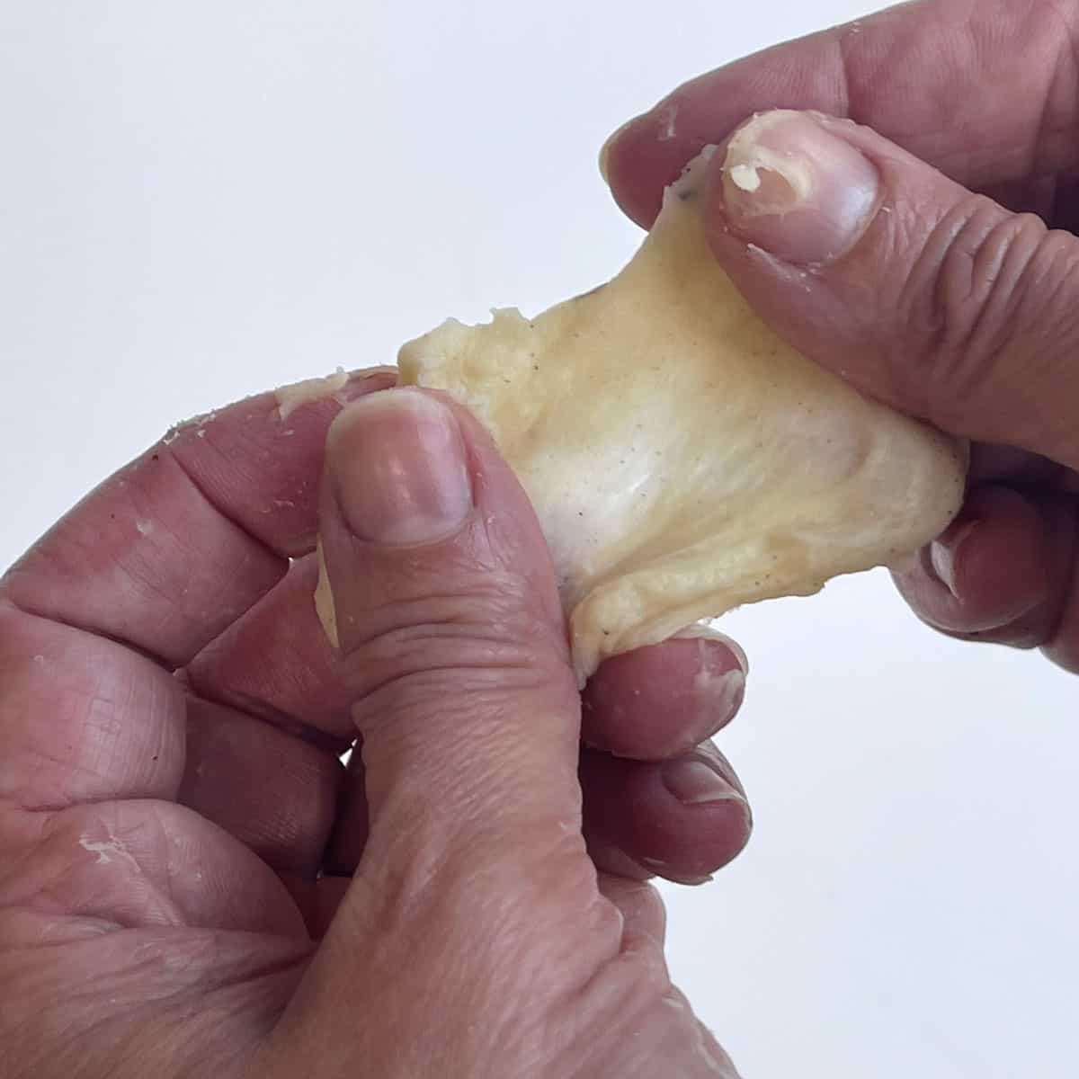 windowpane test - stretching dough between fingers