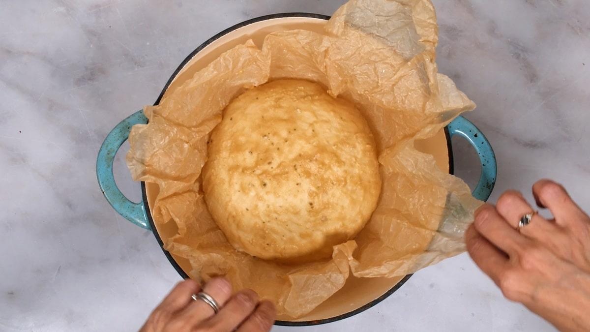 Adding bread to Dutch oven