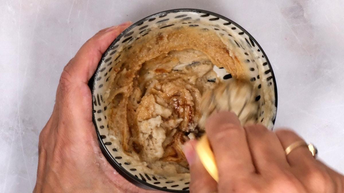 Making a paste with rice flour, oil, Marmite and water to brush on Tiger Bread dough