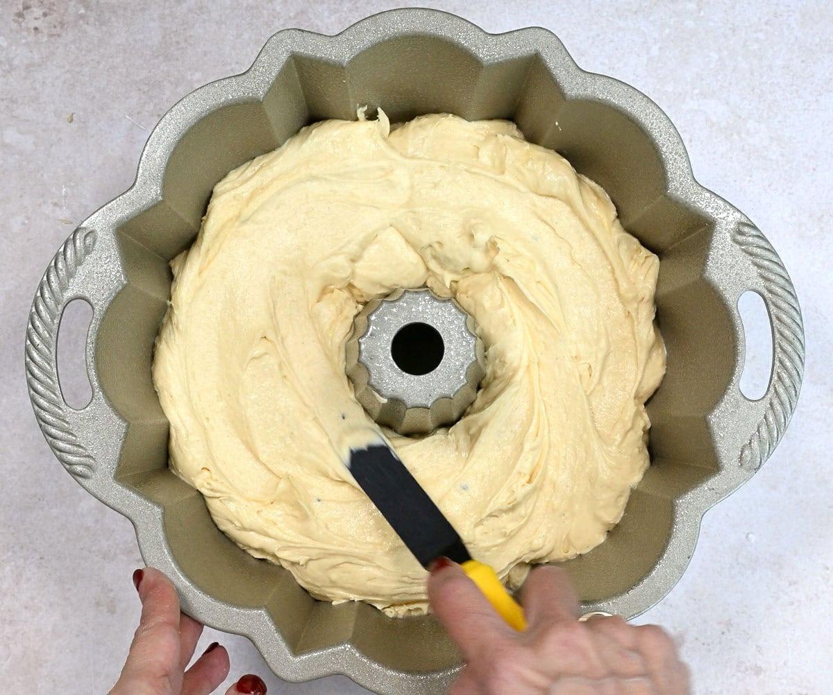 coconut cake batter in a bundt pan