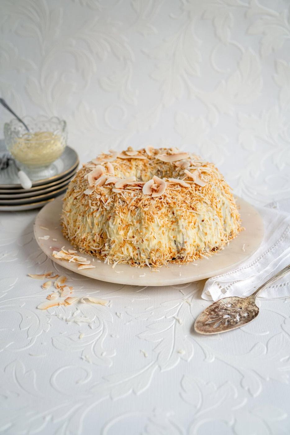 Tom Cruise Coconut Cake (copycat) covered with shredded coconut