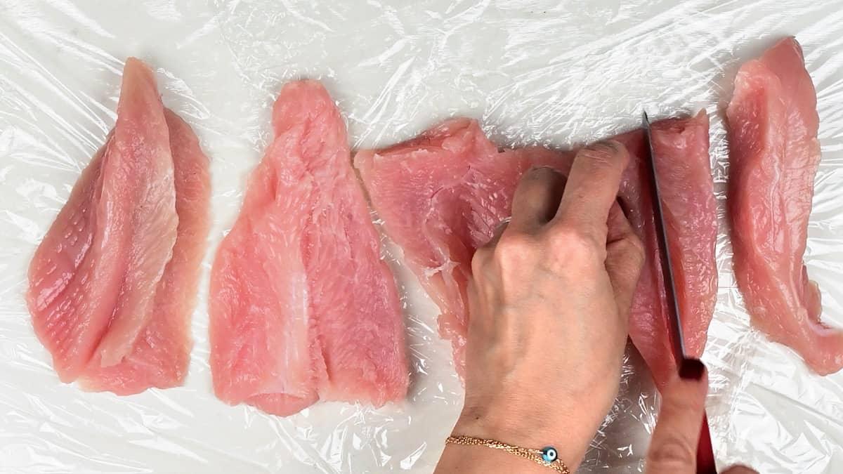 Butterflying turkey breast pieces