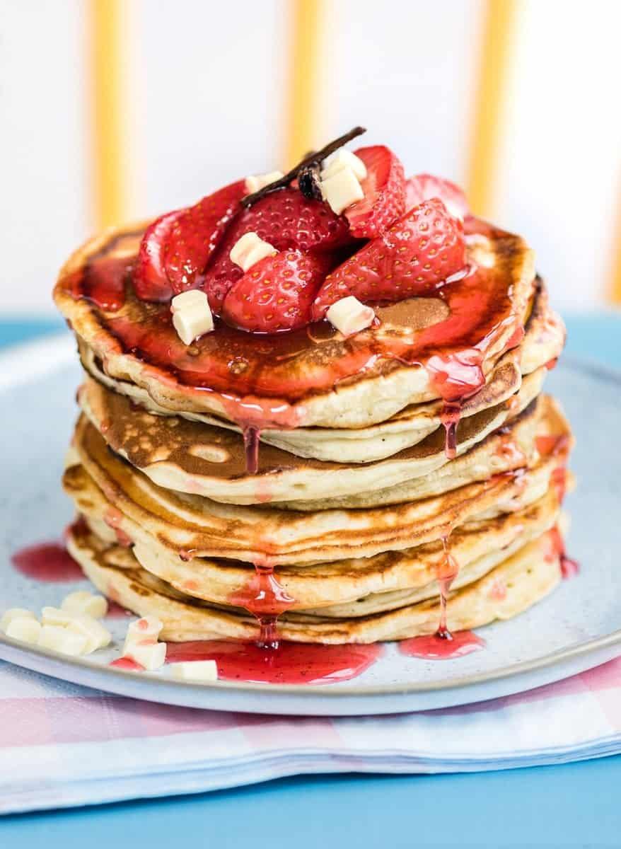 White chocolate pancakes with roasted strawberries